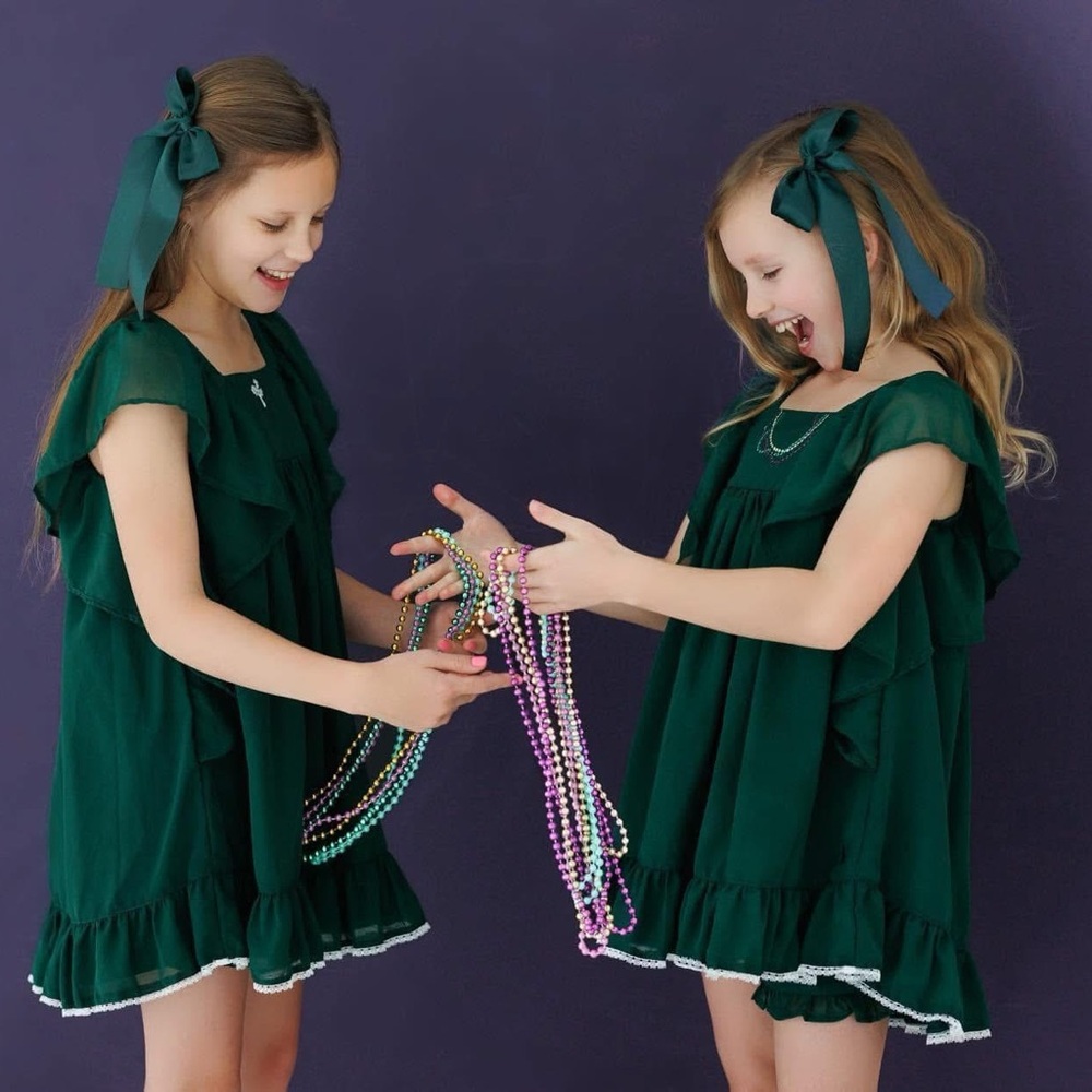 Well Dressed Wolf Green Ana with embroidered Mardi Gras Beads